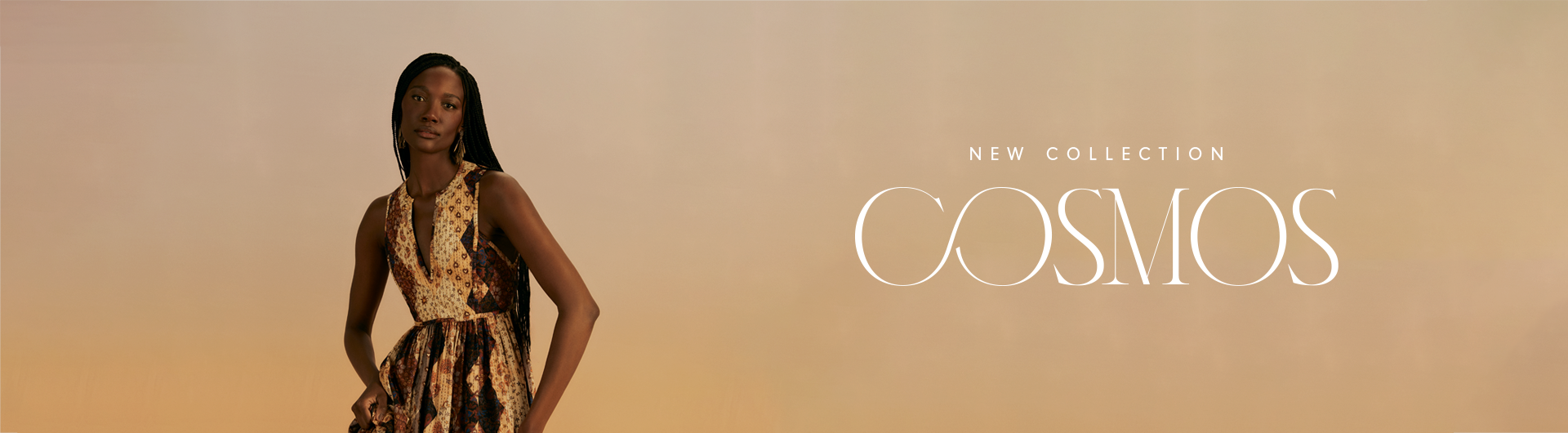 Banner with a warm-toned gradient background, from yellow to beige, featuring a dark-skinned woman with braided hair, wearing a printed dress in earthy tones with geometric patterns. On the right side, the text 'NEW COLLECTION' appears above the word 'COSMOS' in a stylish, stylized font.